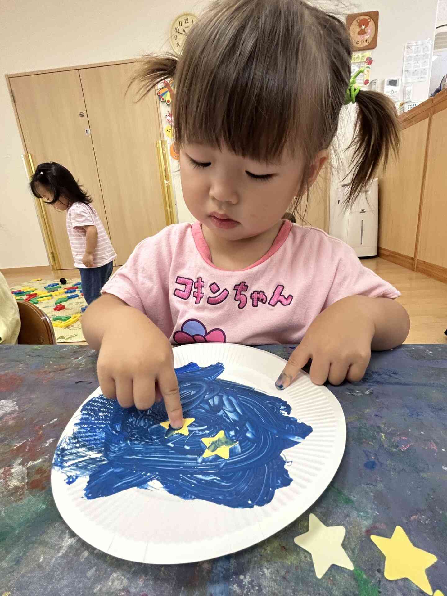 『ここに置こうかな～？』