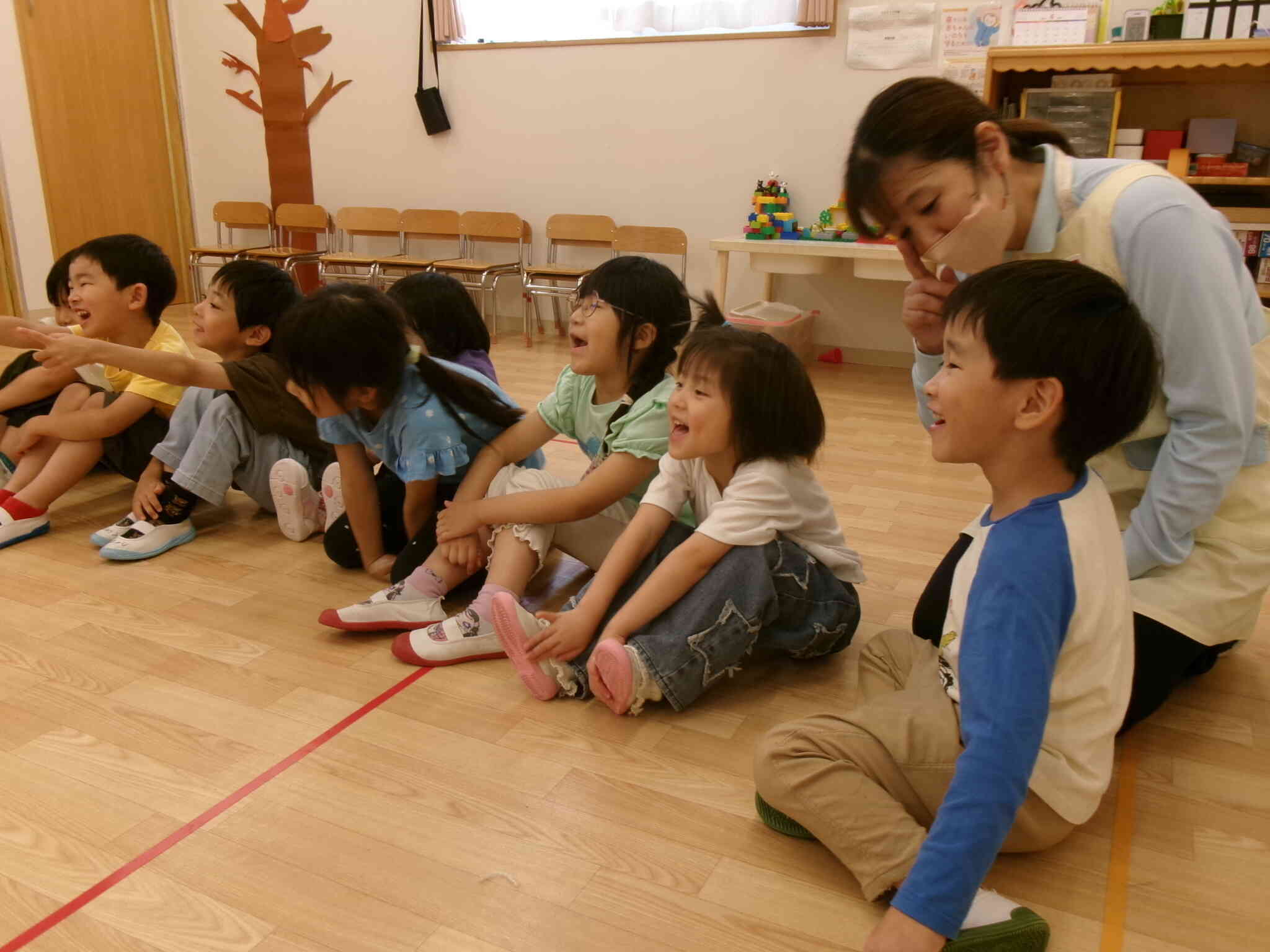先生の後について