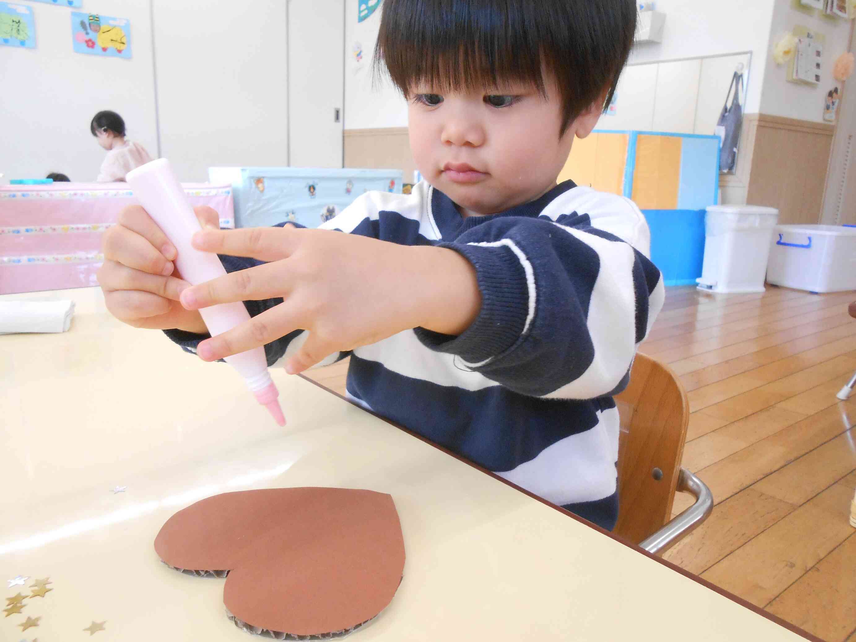 こうやって持つのかな？