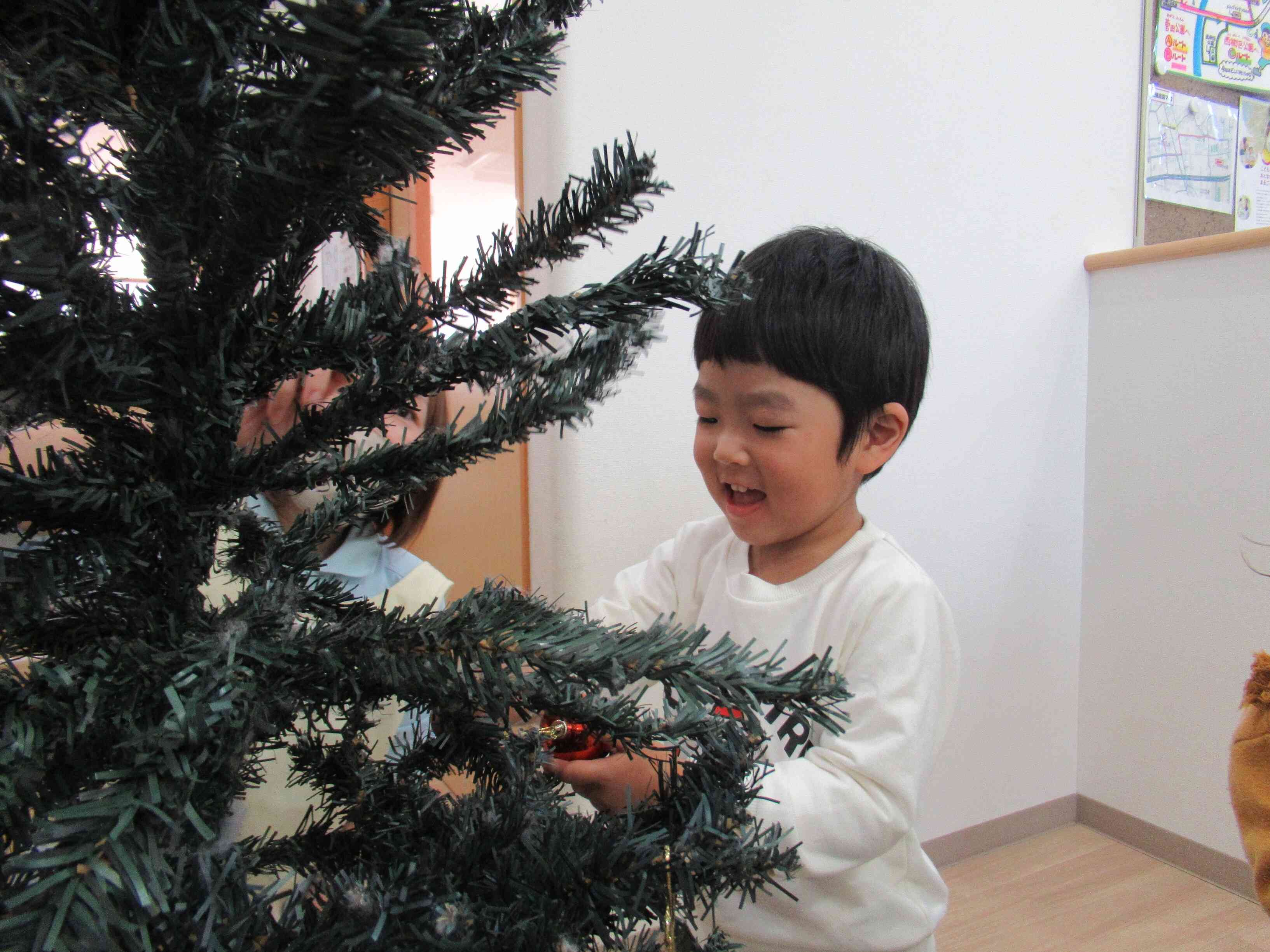 「どこに つけようかな?」