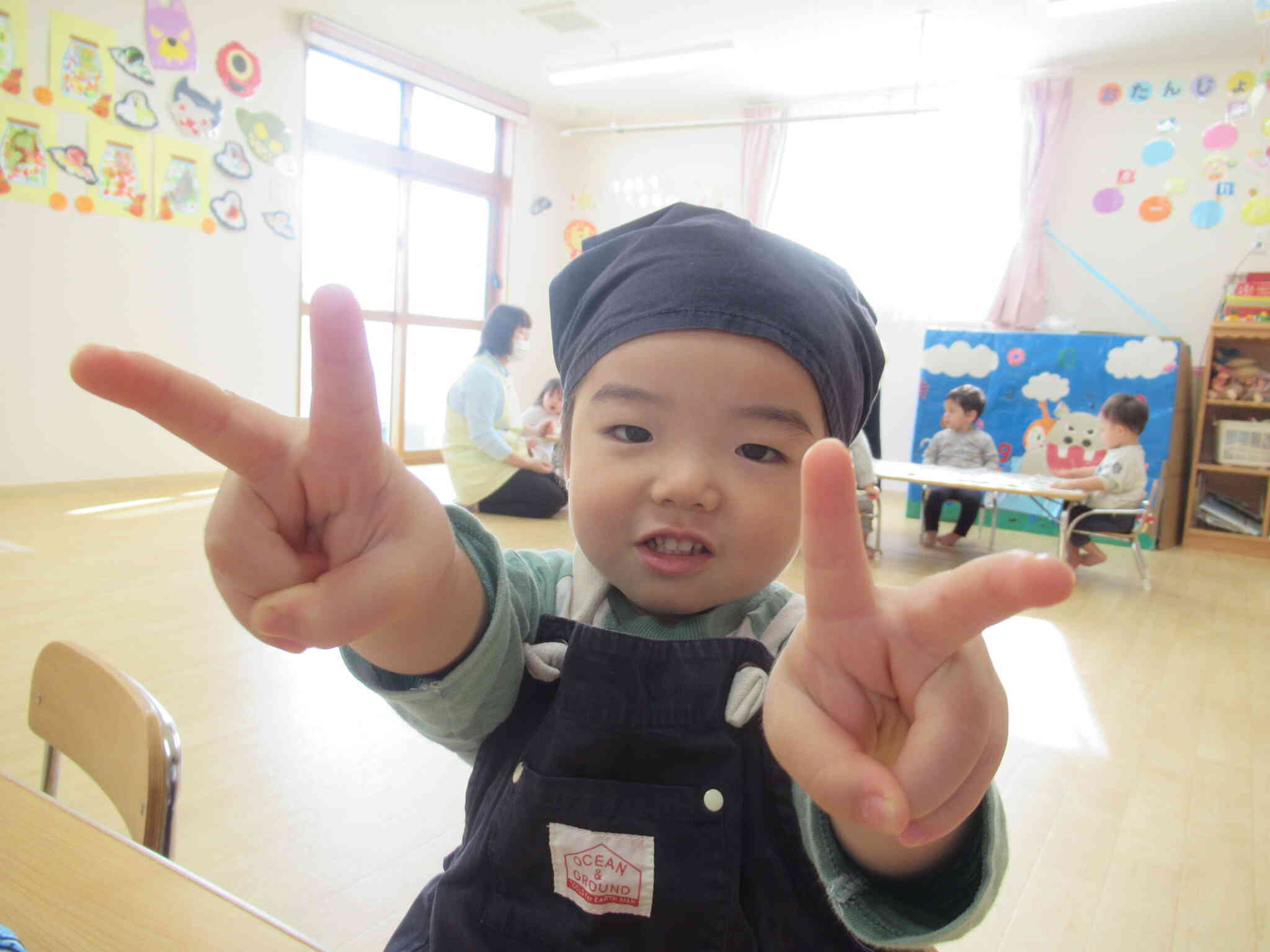 素敵なエプロンでピース！