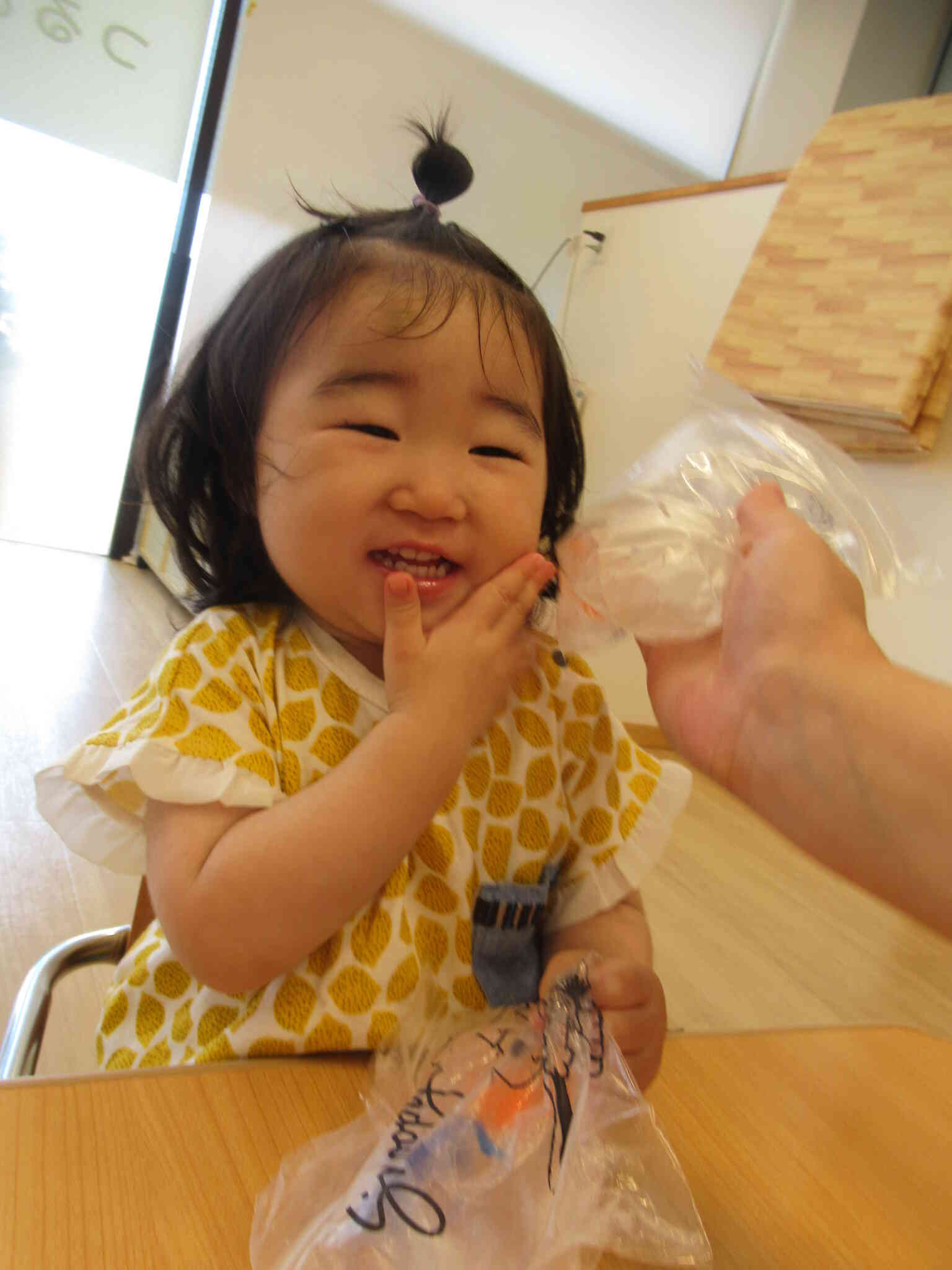 頬っぺたにぺたーん
