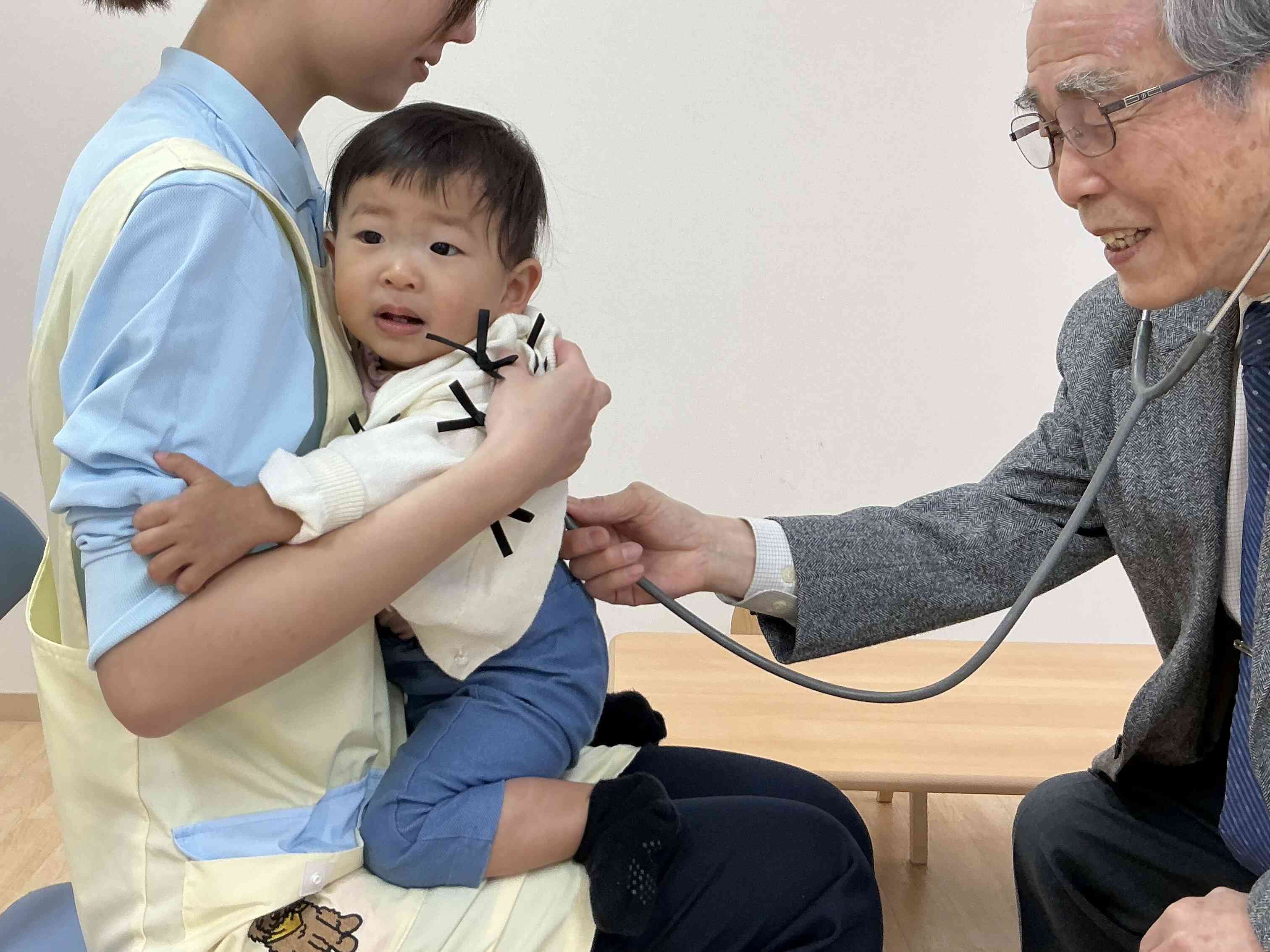 お背中、ポンポン